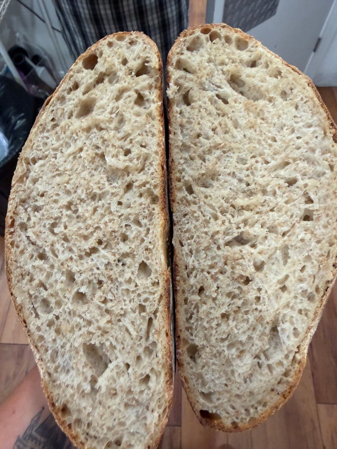 Open crumb inside a freshly cut sourdough loaf
