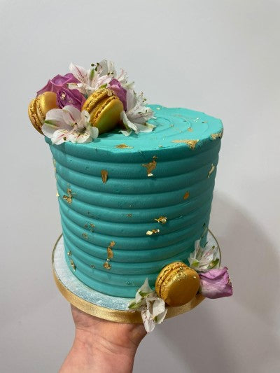 turquoise gold leaf floral cake