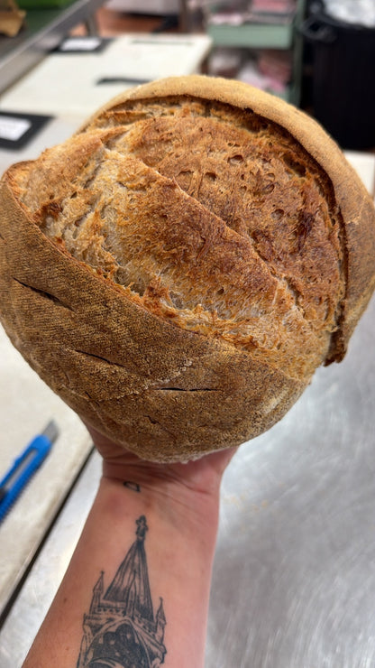 Golden crust on a freshly baked sourdough loaf